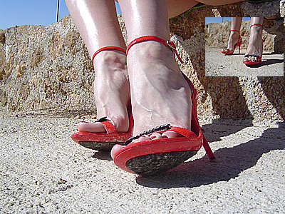 Loosening In Red Sandals High Heels Sitting In The Sun