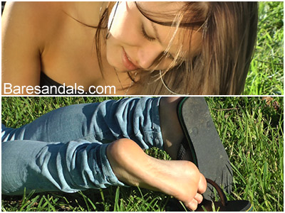 Lucy’s Feet In The Grass And Flip Flops