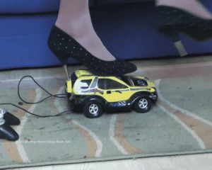 Car Crushed Under Spiked Heels